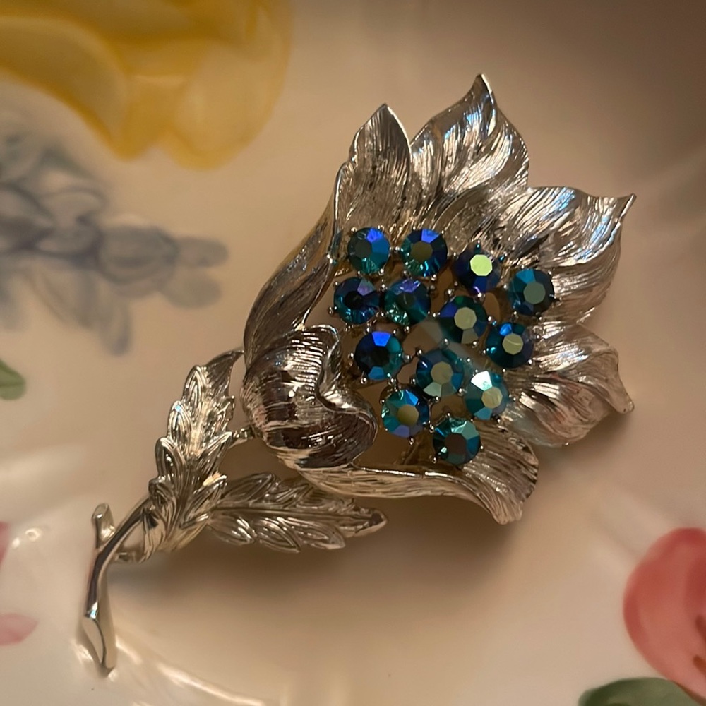 Vintage Signed Coro Pegasus Flower with Eye Catching Dark Blue AB Rhinestones
